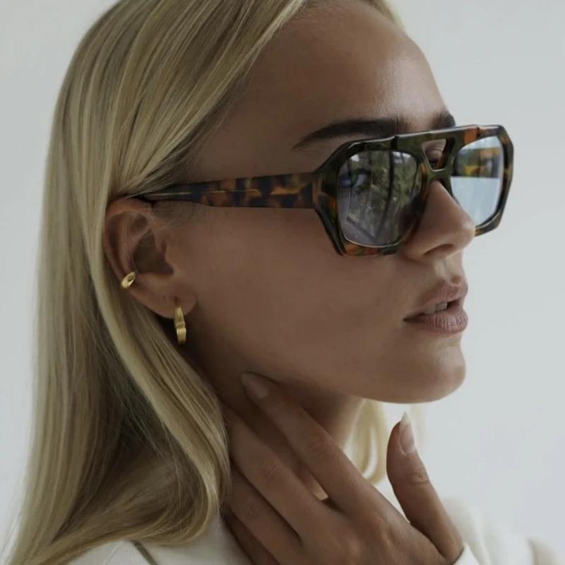 Lunettes anti-lumière design double pont motif léopard - Monture fashion femme protection solaire qualité chasse