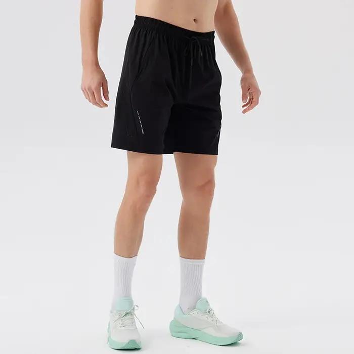 Short de tennis homme en polyester et élasthanne respirant et à séchage rapide pour entraînement et course à pied