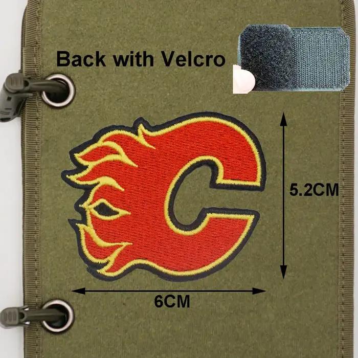 Logo de l'équipe canadienne de hockey sur glace avec crochets