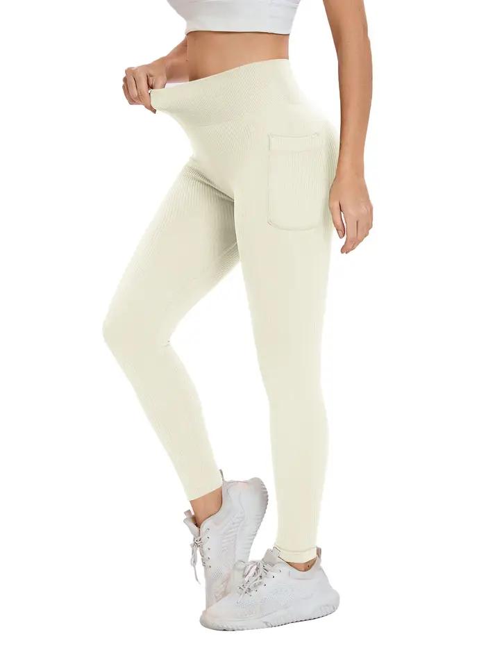 Leggings de sport filetés de couleur unie pour femmes