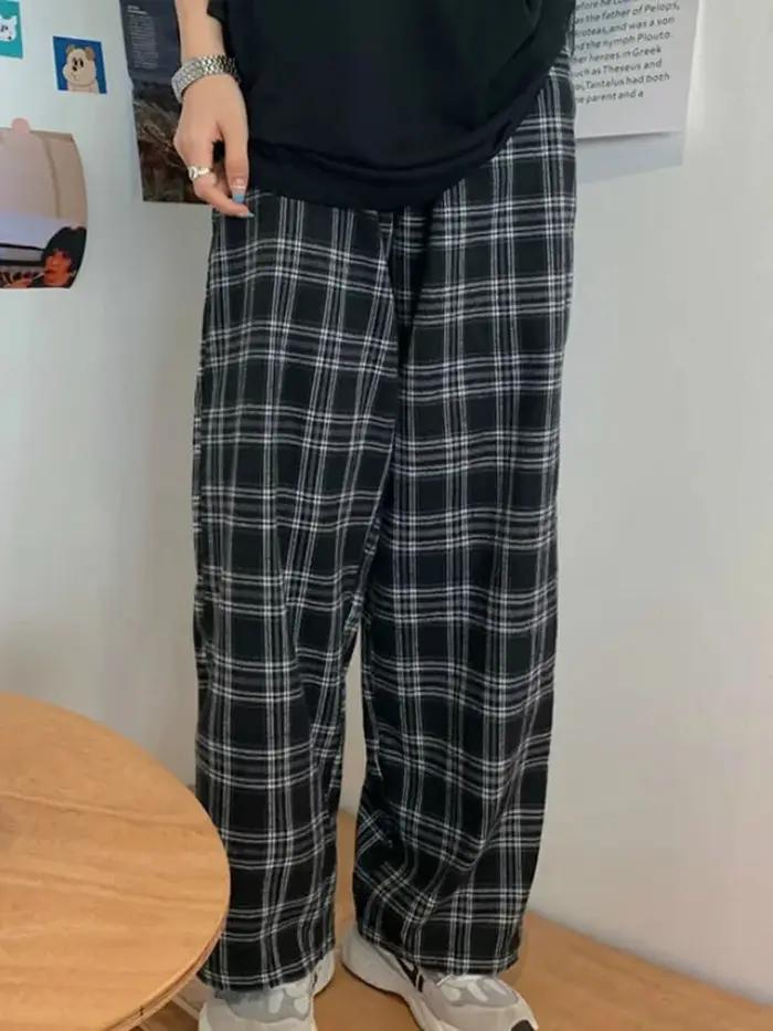 Pantalon à carreaux noir pour femme