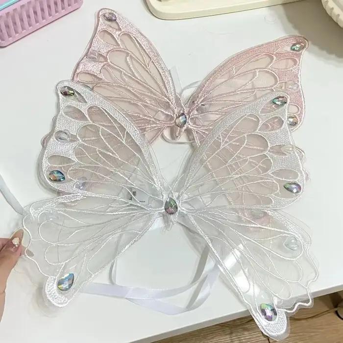 Aile de chien papillon plonger oyante mignonne