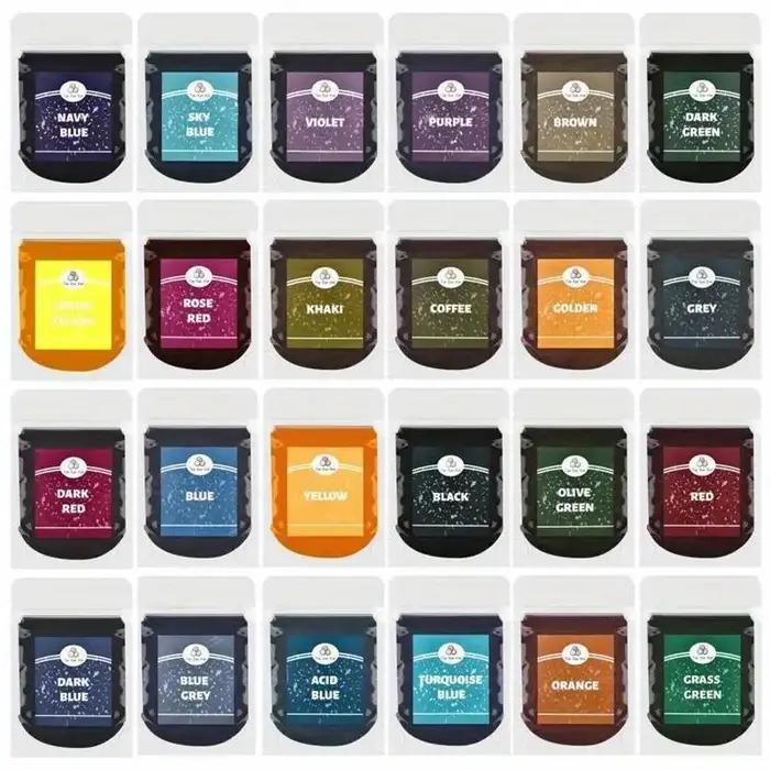 12 sachets de poudre tie-dye de différentes couleurs, colorants reconditionnés pour textiles faits main, adaptés à la teinture des vêtements et des tissus.