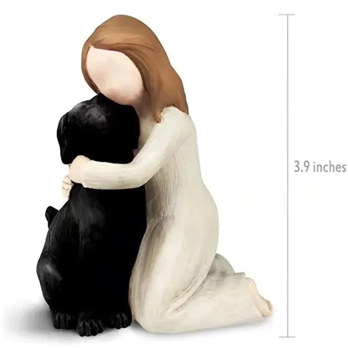 Statue d'ange et de chien mignon de créativité de dessin animé