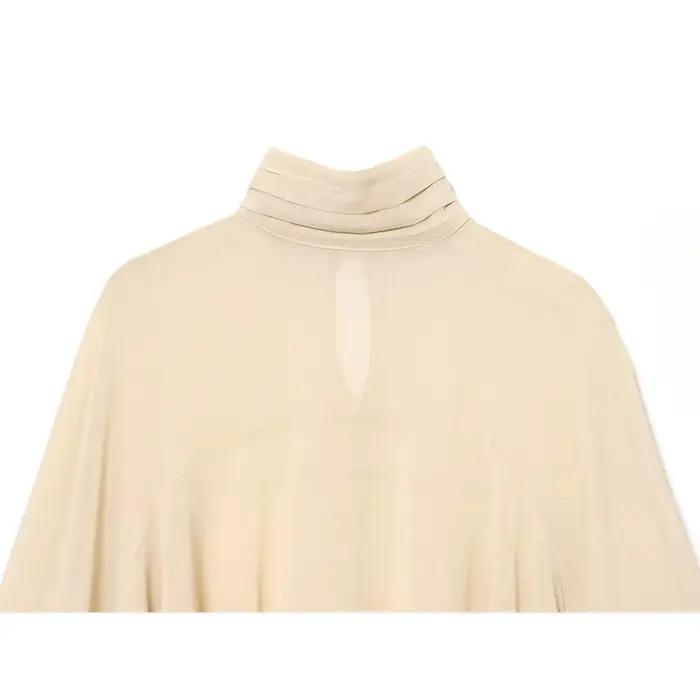 YENKYE nouvelle mode col haut Cape haut pour femmes élégantes ourlet asymétrique chemisier en mousse