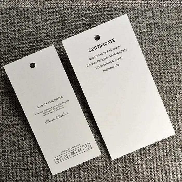 200 pièces pas cher conception personnalisée impression marque Logo papier vêtement étiquettes à suspendre vêtements