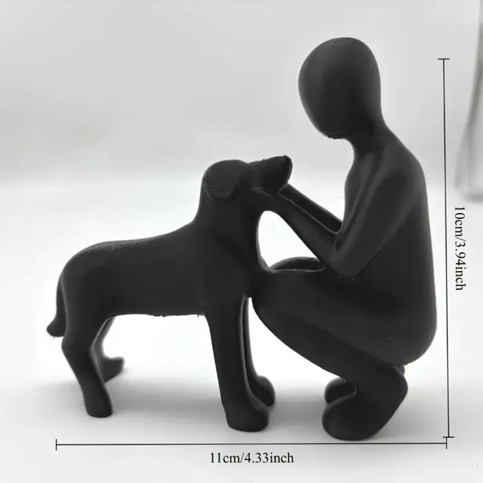 Statue de l'amitié entre humains et chiens
