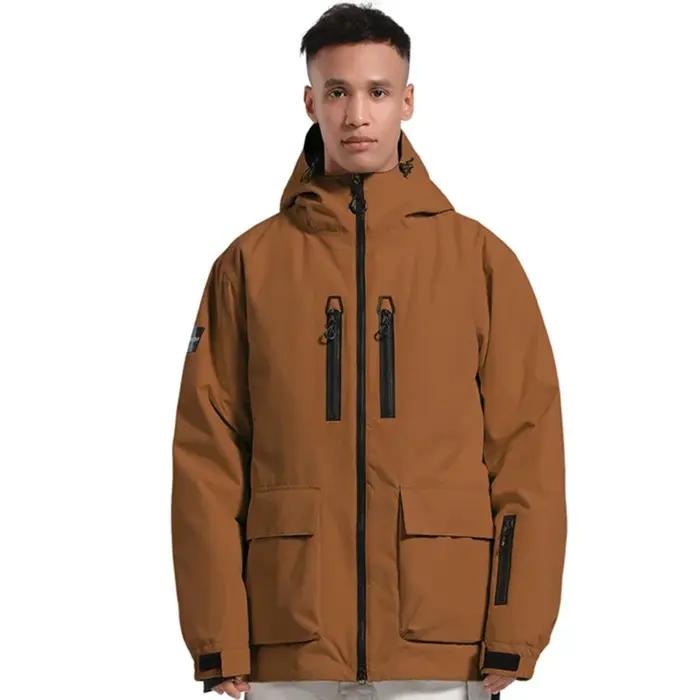 Veste de ski imperméable pour homme et femme avec capuche, matériau polyester et nylon, design géométrique, protection contre la pluie et la neige, adapté au ski, snowboard et randonnée