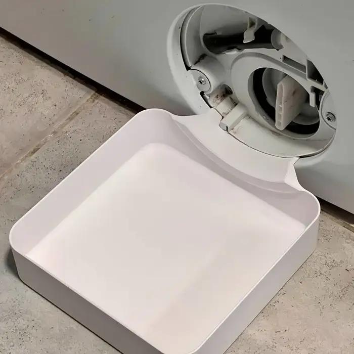 Entonnoir de vidange pour lave-linge - utilisé pour nettoyer le bac de récupération des résidus du filtre anti-peluches, empêchant les fuites d'eau dans la buanderie 