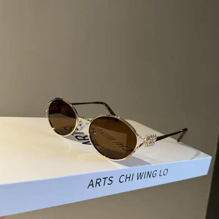 Nouvelle marque de mode lunettes de soleil ovales pour femmes rétro petit cadre femme homme métal