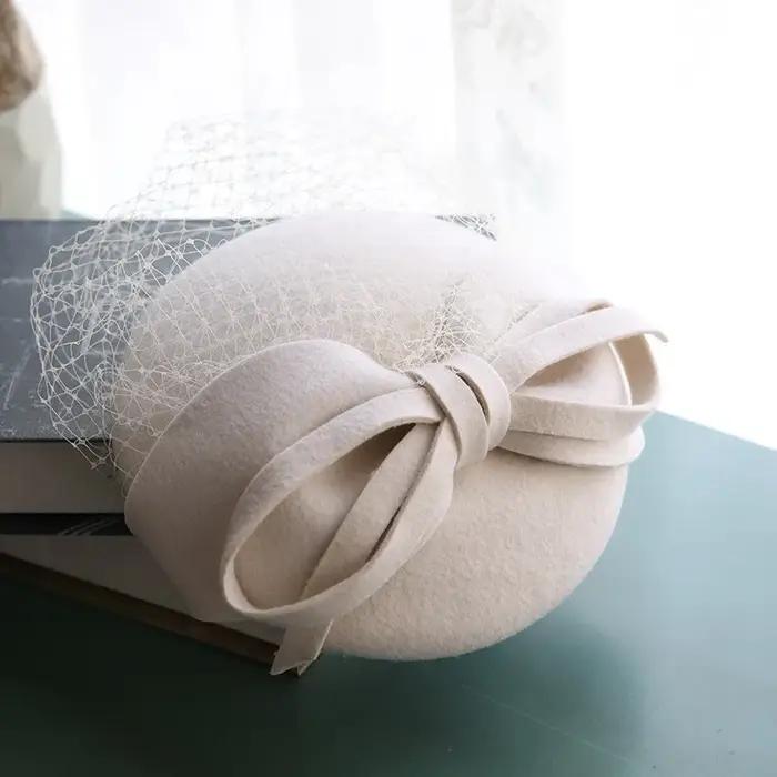 Béret Chic en feutre de laine pour femmes, petits chapeaux avec nœud en voile en maille, chapeau d'é