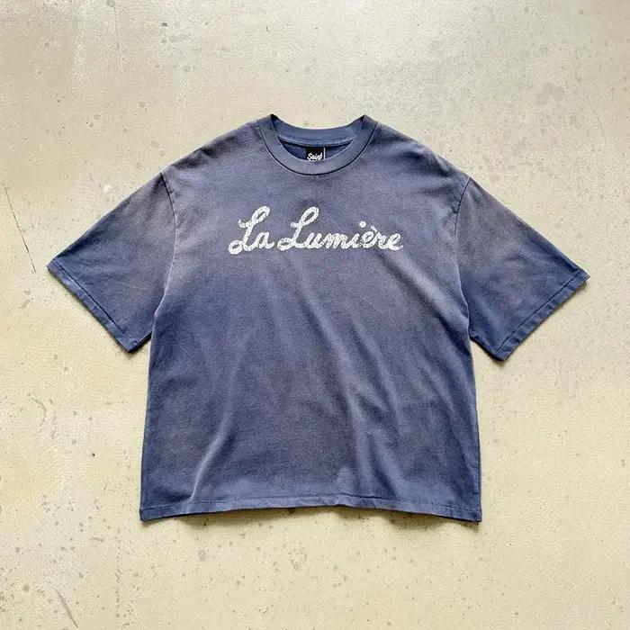 T-shirt décontracté unisexe Saint La Lumière avec logo imprimé lettres craquelées, en coton de qualité supérieure, bleu délavé vintage, coupe ample