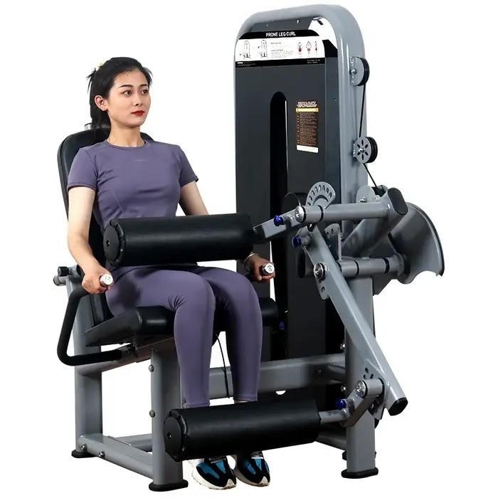 Machine de musculation pour extensions et flexions des jambes
