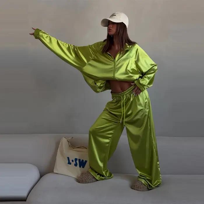 Ensemble décontracté deux pièces pour femmes, nouvelle tendance mode printemps-été 2026, veste sweat-shirt ample à col à revers et pantalon large de sport.