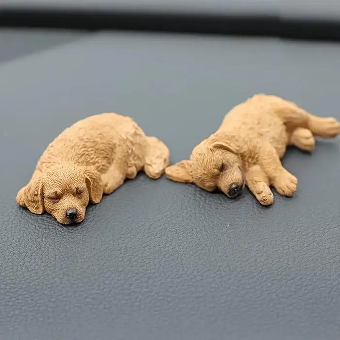 Figurine de chien dormant