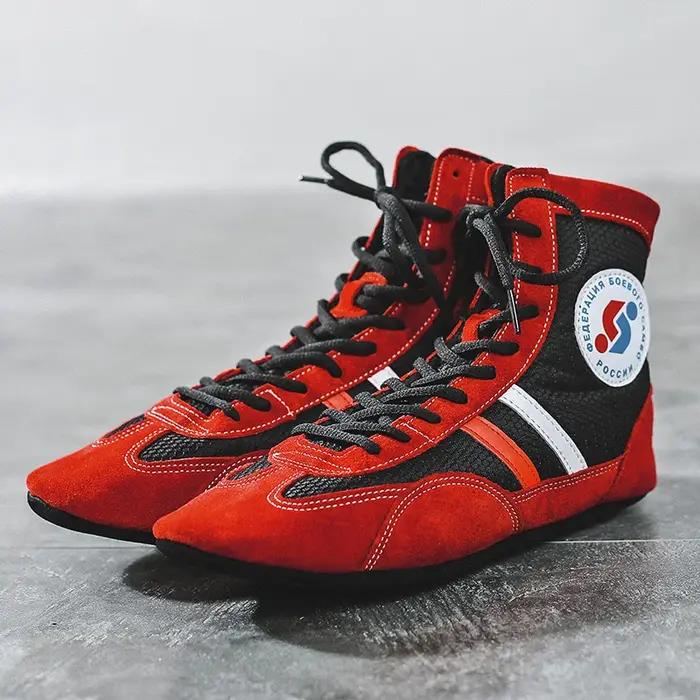Chaussures de boxe professionnelles en cuir à fond souple