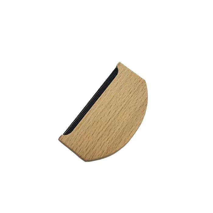 Épilateur en bois pour enlever les peluches