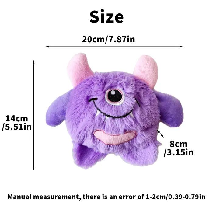 Un petit chien monstre en peluche