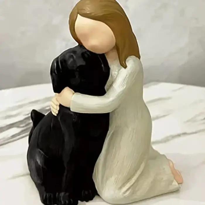 Statue d'ange et de chien mignon de créativité de dessin animé