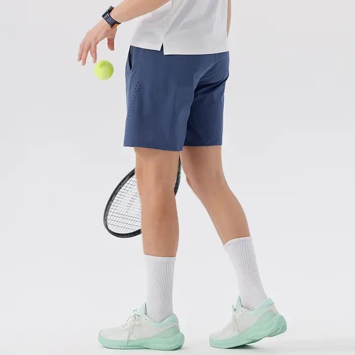 Short de tennis homme en polyester et élasthanne respirant et à séchage rapide pour entraînement et course à pied