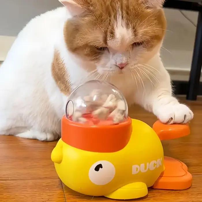 Jouet distributeur de nourriture pour chiens et chats en forme de canard jaune mignon pour améliorer l'interaction et réduire l'anxiété