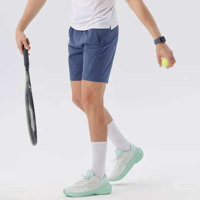 Short de tennis homme en polyester et élasthanne respirant et à séchage rapide pour entraînement et course à pied