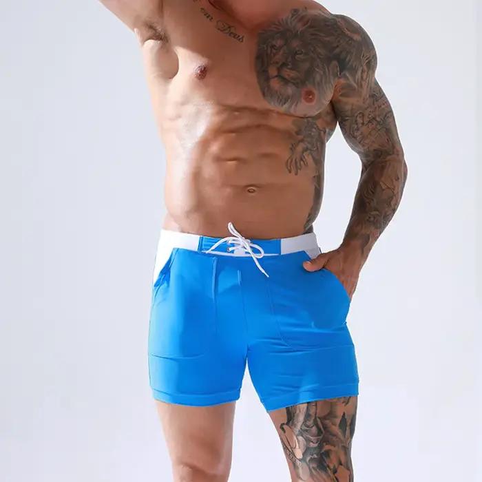 Maillot de bain extensible pour hommes, à séchage rapide, culotte de plage, avec poches, pour Sports