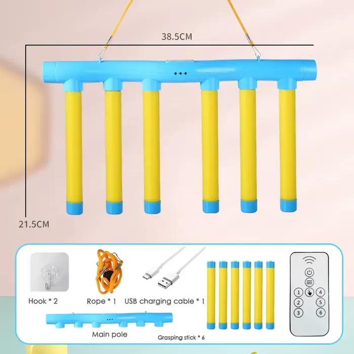 Jeu de bâtonnets qui tombent pour enfants développement moteur coordination réaction rapide occasionnel occasion spéciale