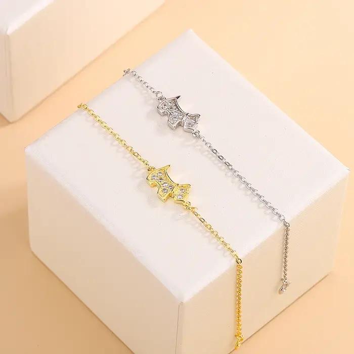 Bracelet en argent sterling 925 serti de zirconium avec breloque chien élégant à offrir pour femmes occasions spéciales