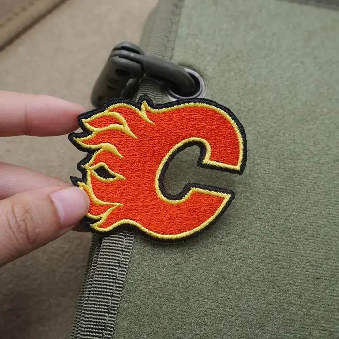 Logo de l'équipe canadienne de hockey sur glace avec crochets