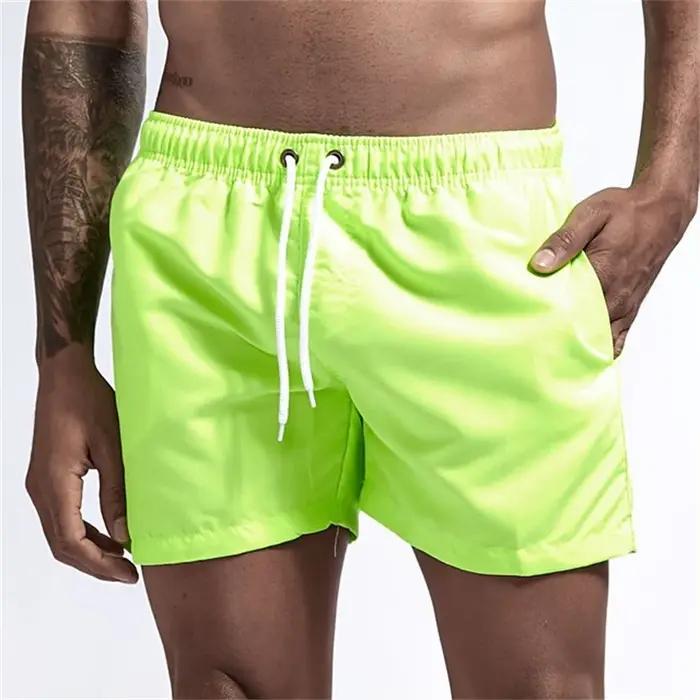 Maillot de bain pour hommes avec doublure en maille poches latérales short de plage solide séchage rapide léger cordon