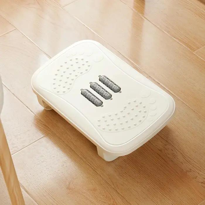 Repose-pieds de bureau en plastique avec design massant pour stimuler la circulation sanguine et améliorer la posture chez soi et au bureau