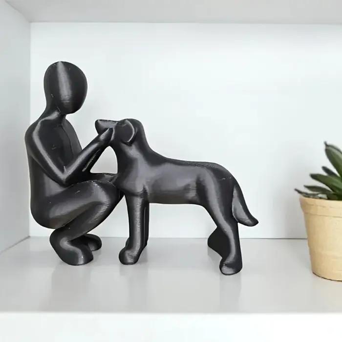 Statue de l'amitié entre humains et chiens
