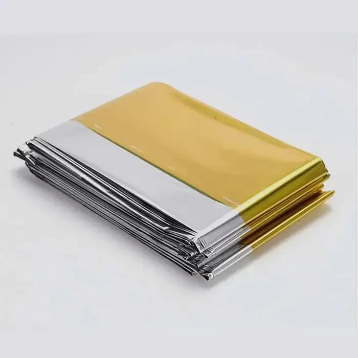 Couverture d'isolation multifonctionnelle double face pour activités de plein air et survie en extérieur finition argent multifonctionnelle polyvalente et durable
