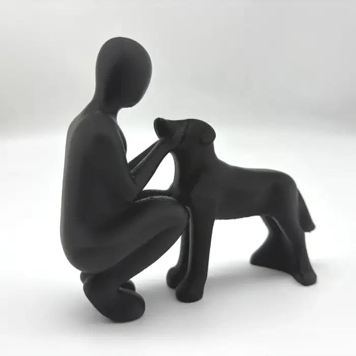 Statue de l'amitié entre humains et chiens