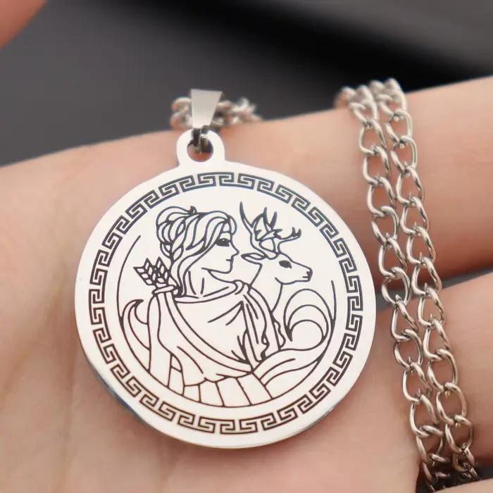Collier pendentif rond vintage en acier inoxydable