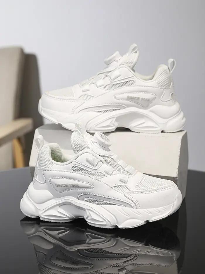 Boucle rotative à enfiler! Chaussures de sport noires en mesh pour enfants, respirantes et anti-chau