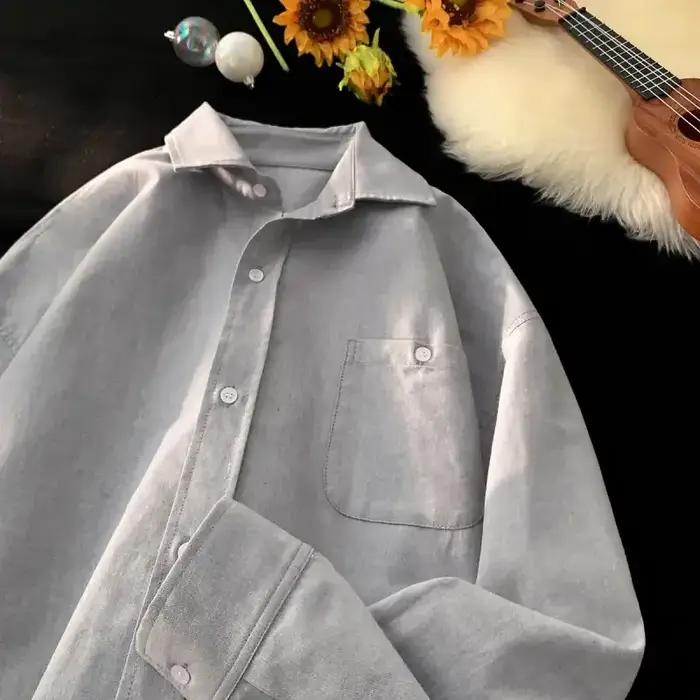 Vêtements pour hommes bleu clair à manches longues boutonné chemise poche ample chemisier en coton décontracté