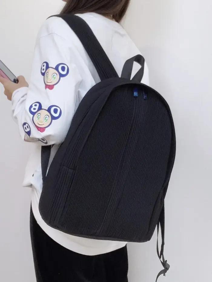 Sac à dos plissé en polyester décontracté pour homme et femme avec fermeture éclair pour voyager étudier et sortir