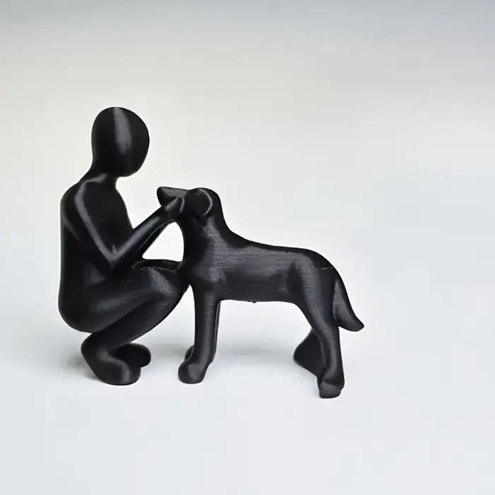 Statue de l'amitié entre humains et chiens