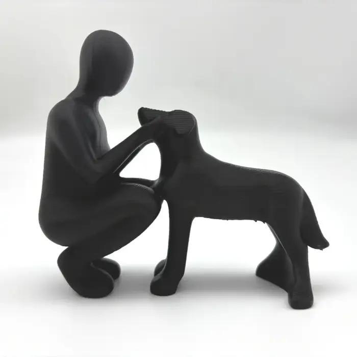 Statue de l'amitié entre humains et chiens