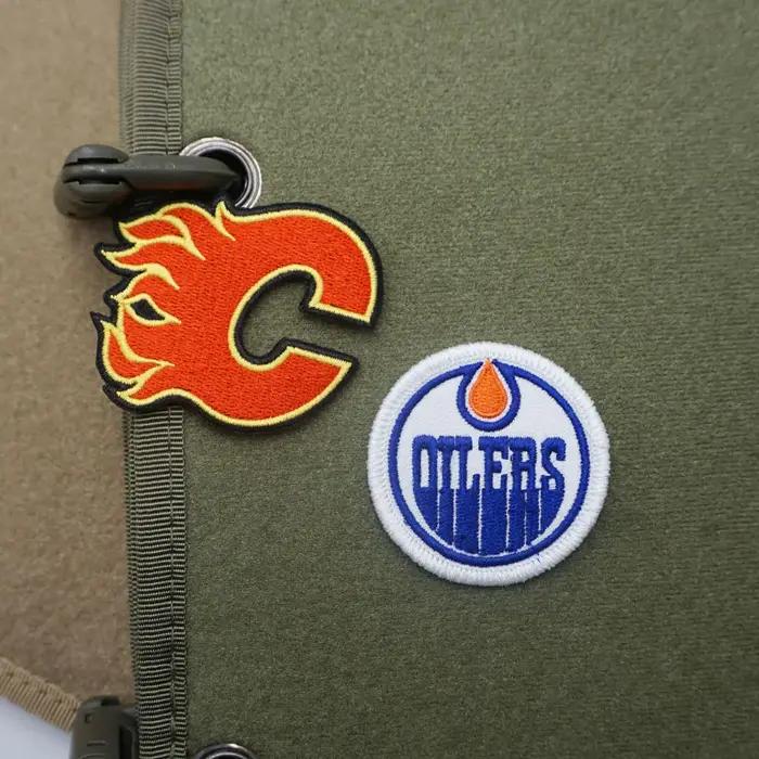 Logo de l'équipe canadienne de hockey sur glace avec crochets