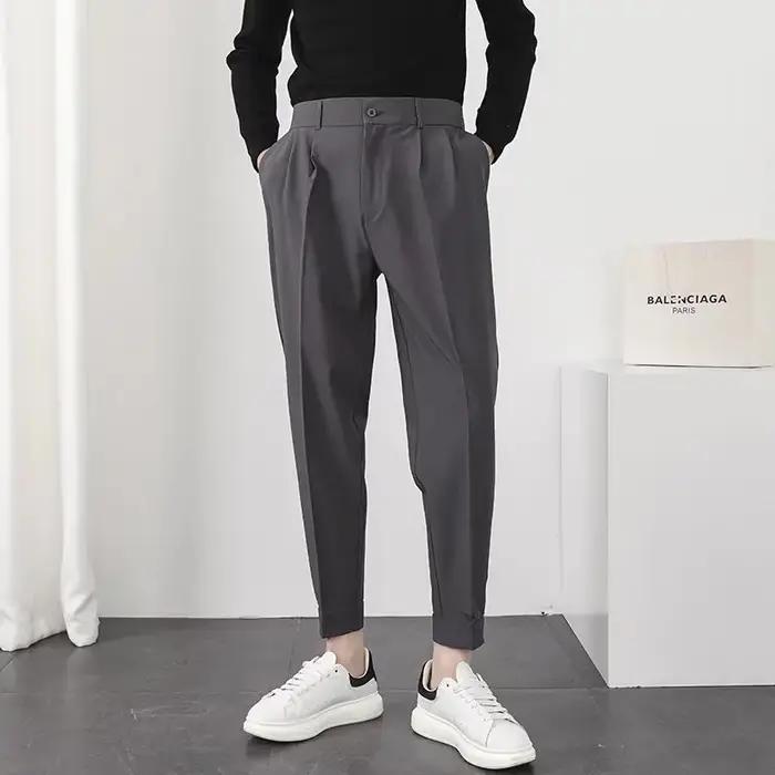 Pantalon homme style coréen slim élastiqué pieds réduits pour tenue streetwear élégante