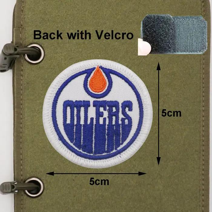 Logo de l'équipe canadienne de hockey sur glace avec crochets