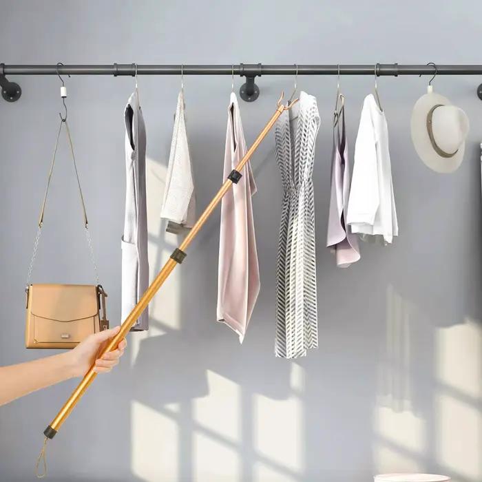 Cintre rétractable pour le séchage des vêtements