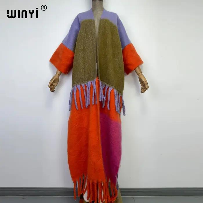 Manteau de fourrure long pour femme de haute qualité style bohème avec col en V et glands de cou pour hiver occasions spéciales