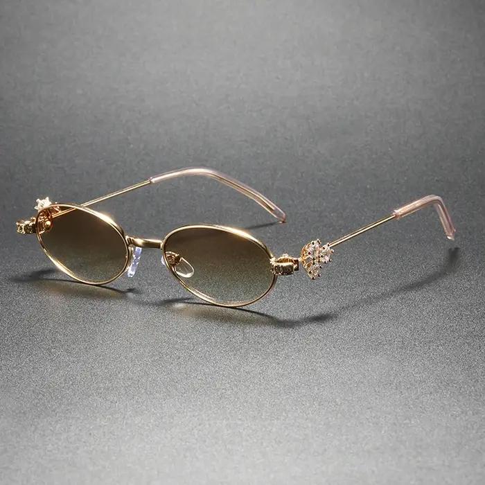 Lunettes de soleil élégantes en cuivre avec protection UV400 pour femmes, lunettes de soleil ovales incrustées, lunettes de soleil haut de gamme, lunettes de soleil pour occasions spéciales