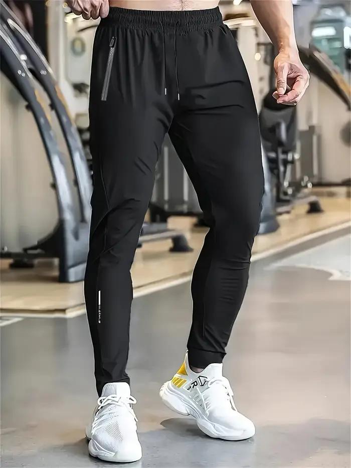 Pantalon de sport léger avec poche à fermeture éclair pour homme
