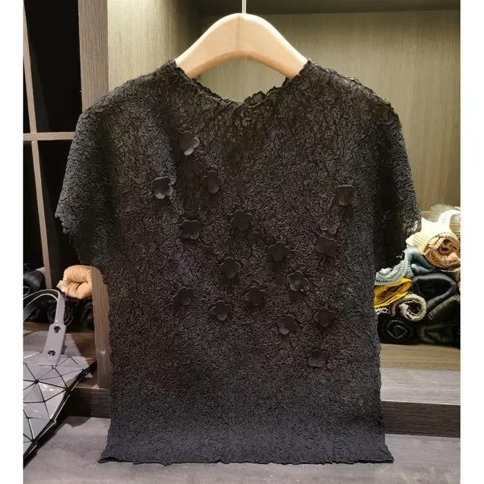 T-shirt plissé Miyake 2026 Nouveau motif floral 3D Couleur unie Manches courtes Simple Décontracté Léger Extensible Haut pour femme Vêtement sans repassage