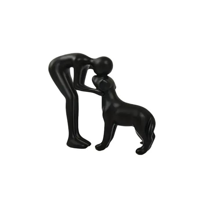 Sculpture abstraite homme et chien